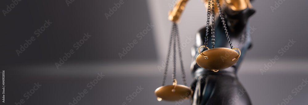 Justice blindfolded lady holding scales
