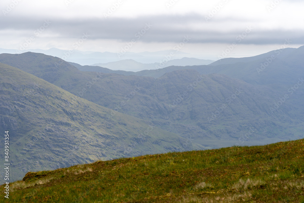 Panoramic view from Devils Ladder, one of most difficult trails, that is leading to highest Irish mountain Carrauntoohill or Carrantuohill is the highest mountain in Ireland at 1038m in Ring of Kerry Panoramic view from Devils Ladder, one of most difficult trails, that is leading to highest Irish mountain Carrauntoohill or Carrantuohill is the highest mountain in Ireland at 1038m in Ring of Kerry