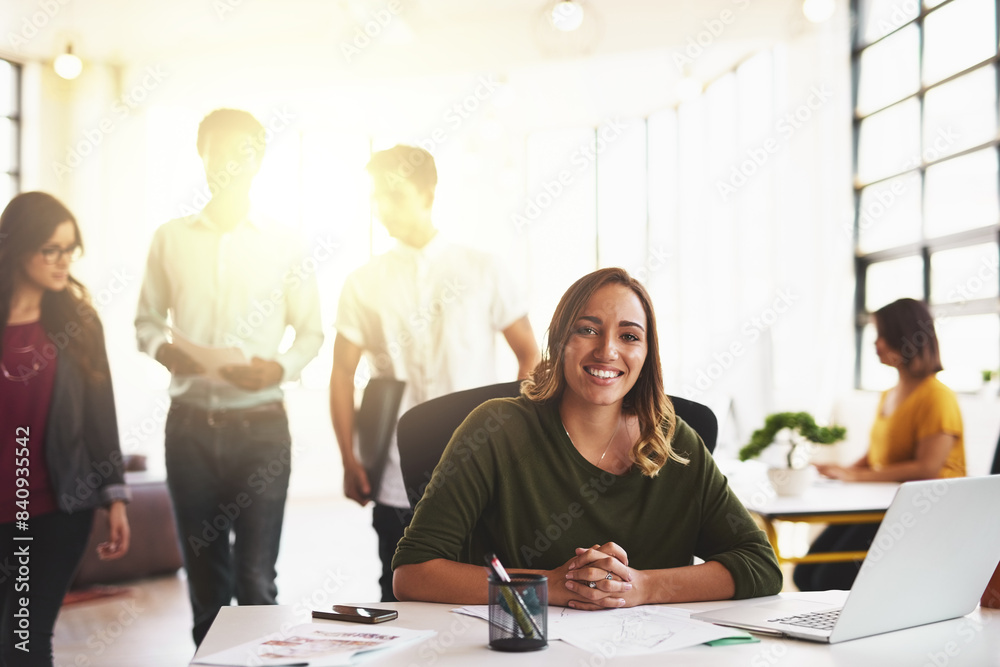 Fototapeta premium Business woman, smile and portrait with laptop at desk in office for creative startup company. Face, happy professional and technology for graphic designer, entrepreneur or web designer agency