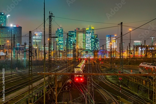 Train and tracks in front of main station and skyline Frankfurt Main in the evening at Hochnebel, main station, Frankfurt, Hesse, Germany, Europe photo