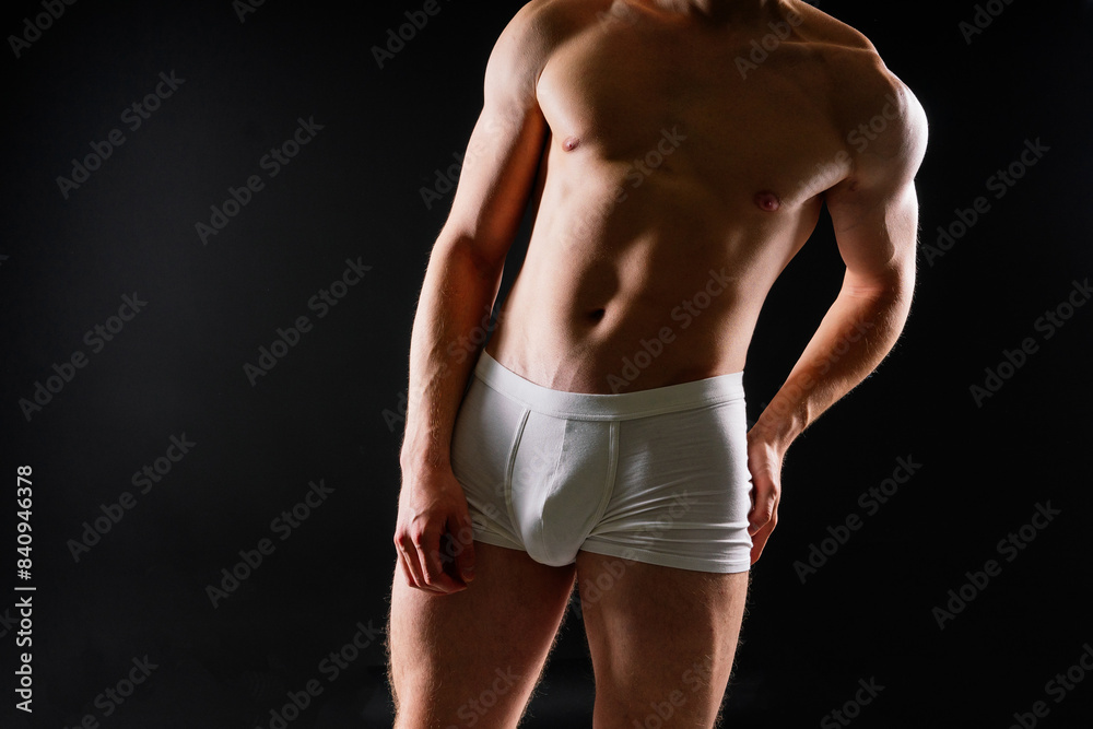 Fototapeta premium Close up on perfect abs. Strong bodybuilder with six pack