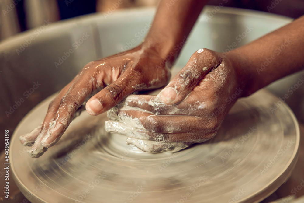 Close up of hands on a pottery wheel Close up of hands on a pottery wheel