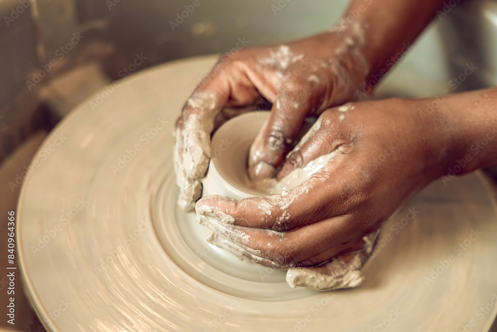 Close up of hands on a pottery wheel Close up of hands on a pottery wheel