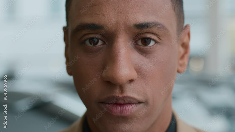 Male portrait African American 30s man ethnic guy businessman driver close up client millennial raise head serious sad face looking at camera indoors customer buyer salesman at car showroom auto store