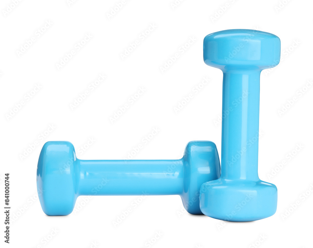 Light blue dumbbells isolated on white. Sports equipment Light blue dumbbells isolated on white. Sports equipment