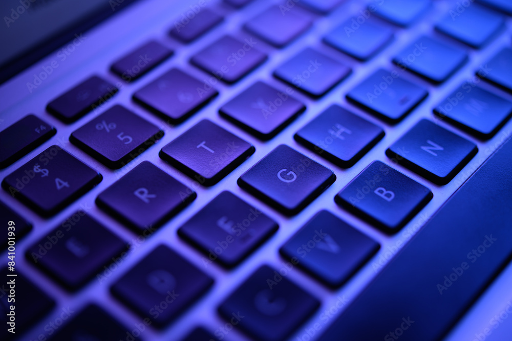 Close-Up Shot of a Glowing Blue Keyboard under Low Light, Detailing Keys R, T, Y and Others Close-Up Shot of a Glowing Blue Keyboard under Low Light, Detailing Keys R, T, Y and Others