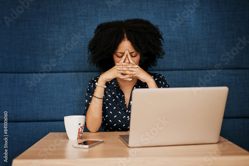 Woman, headache and laptop with stress at cafe in burnout, financial crisis or debt. Female person, hands and tired employee with migraine, depression or deadline anxiety on computer at coffee shop