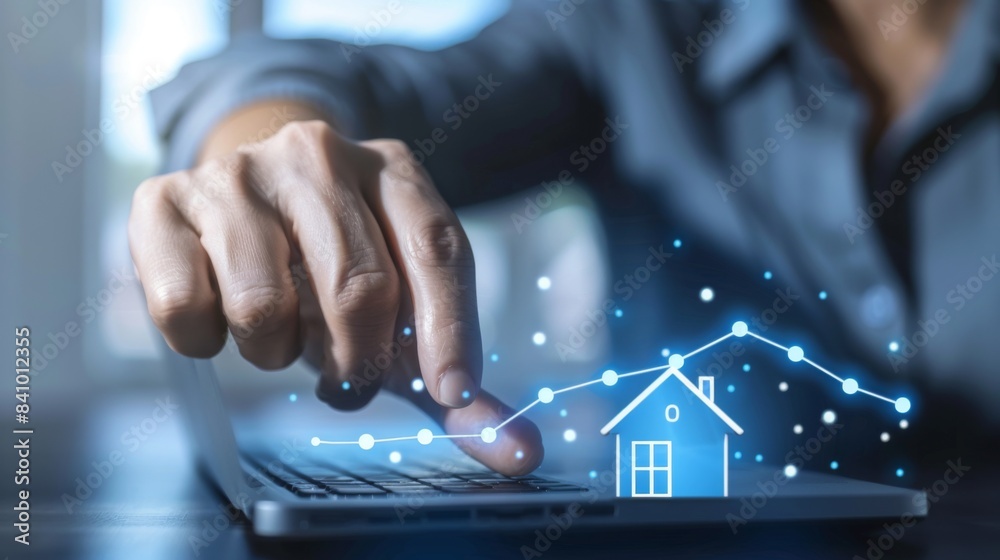 Fototapeta premium Businessman Holding Virtual Home Icon and trading Up and Down
