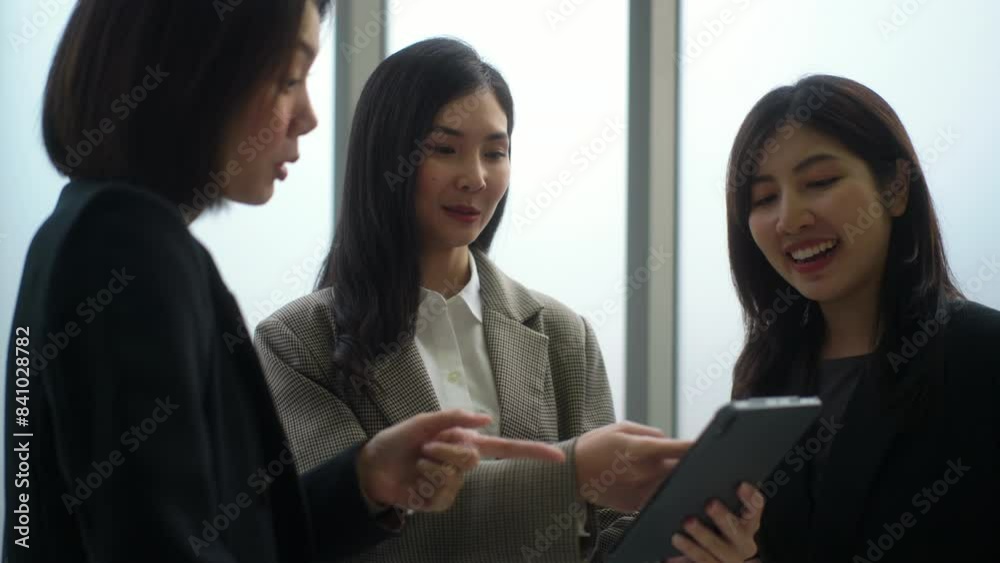 Young motivated asian business woman talking with team and cheer up team, young female leader entrepreneur brainstorming idea for strategy development with colleague startup partnership.
