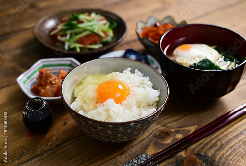 卵かけご飯定食 明太子、漬物、人参きんぴら、水菜とサーモンの和え物 photo