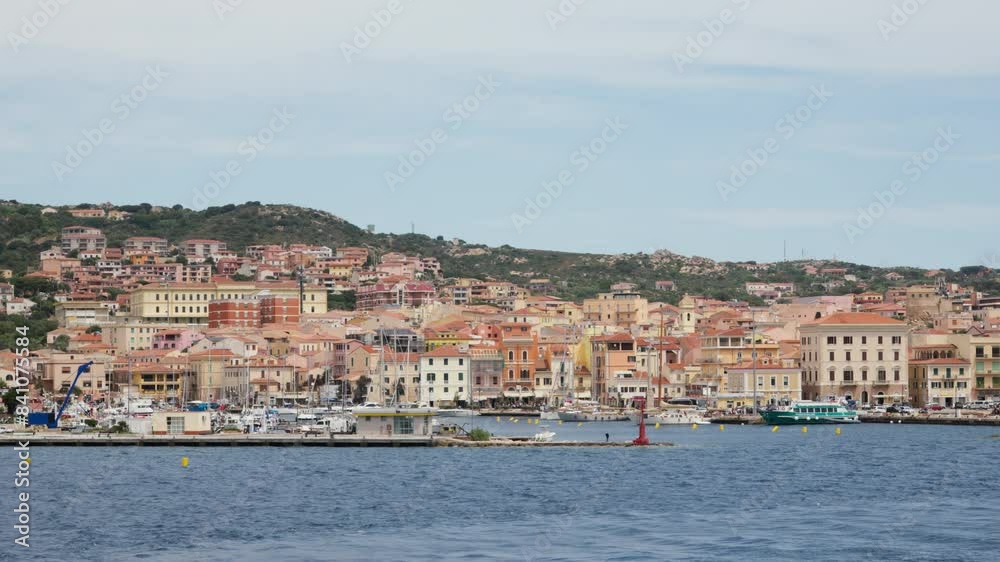 Scenic view of La Maddalena coastal town and marina. Scenic view of La Maddalena coastal town and marina.