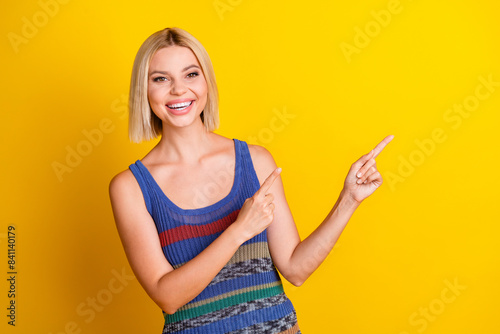 Photography Photo portrait of young sweet beautiful woman in singlet directing fingers empty