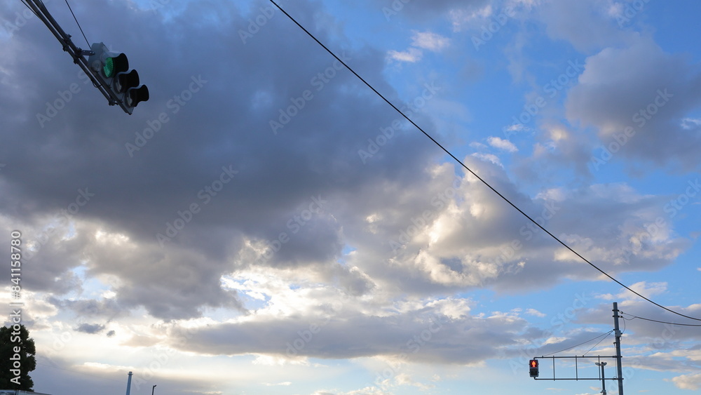 Signal wires stretching straight into the sunset sky
Signal wires stretching straight into the sunset sky