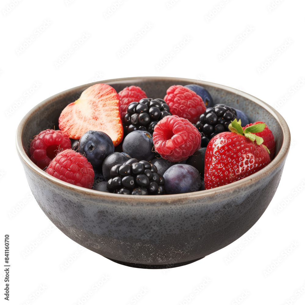 A rustic bowl filled with fresh assorted berries including strawberries, blueberries, raspberries and blackberries A rustic bowl filled with fresh assorted berries including strawberries, blueberries, raspberries and blackberries