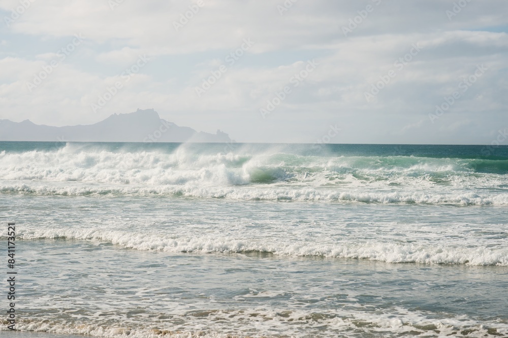Majestic Waves Crashing on Pristine Beach Majestic Waves Crashing on Pristine Beach