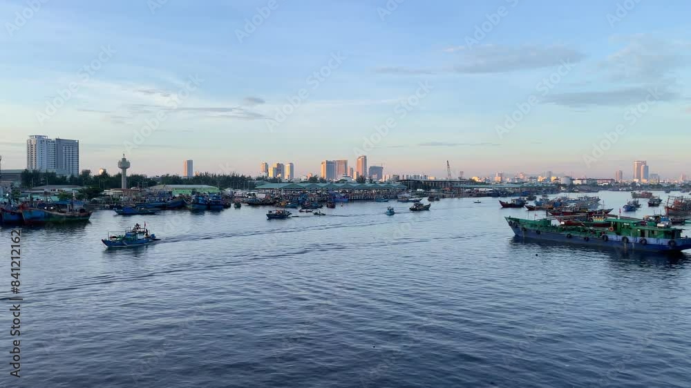 established of da nang Vietnam famous tourist fisherman colonial town at sunset, view from port with skyline cityscape at distance established of da nang Vietnam famous tourist fisherman colonial town at sunset, view from port with skyline cityscape at distance