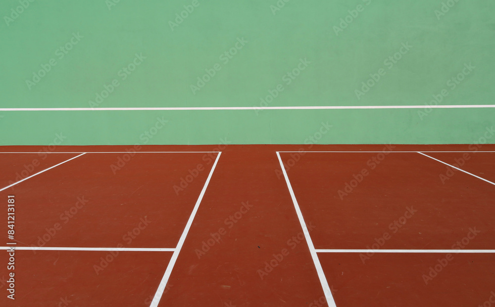 Practice wall and tennis court surface for training. Background and texture, copy space.