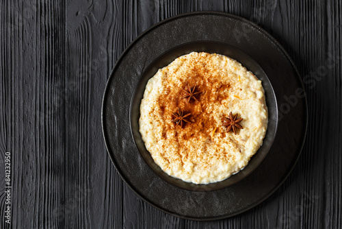 rizogalo, creamy greek rice pudding in a bowl photo