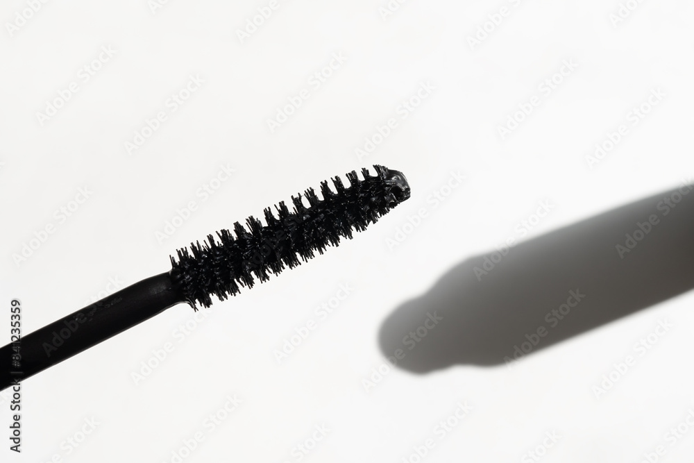 black mascara on white background close-up black mascara on white background close-up