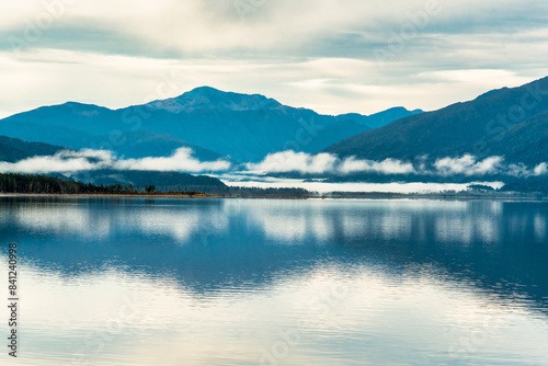Ethereal blue tones of lake Brunner, West Coast NZ early in the morning