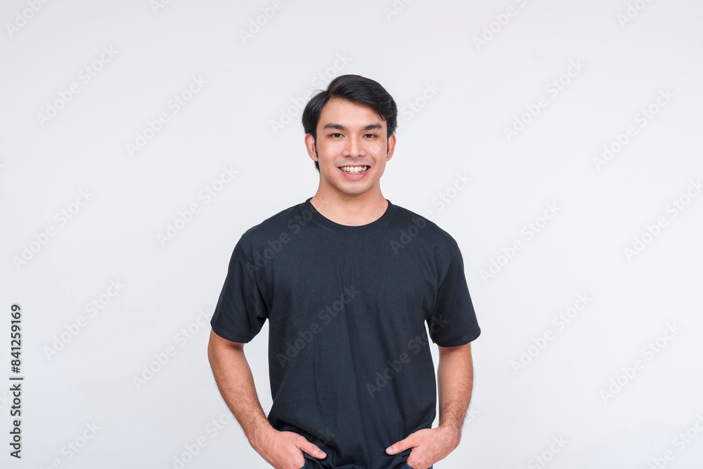 Handsome young man in black shirt with white background Handsome young man in black shirt with white background