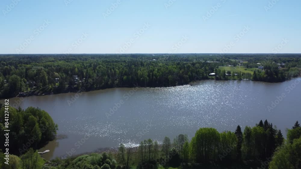 Copy space blue sky horizon on sparkling blue northern boreal lake Copy space blue sky horizon on sparkling blue northern boreal lake