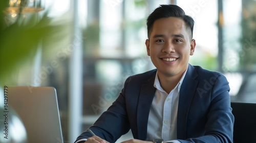 Portrait of male Filipino handsome business leader, modern bright office boardroom, professional atmosphere, leadership, diverse workplace, corporate setting.