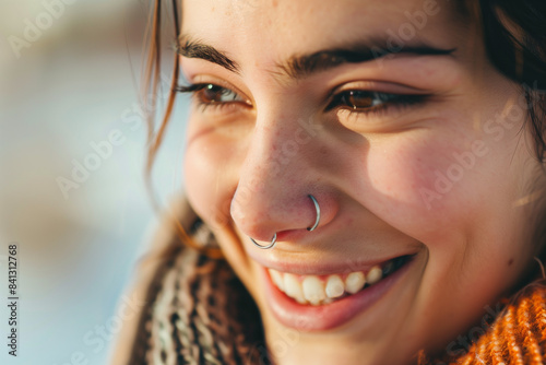 Porträt einer jungen Frau mit Nasenpiercing photo