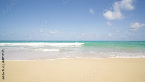 Beach with sky and clouds, Landscape waves nature splashes beach sunlight.