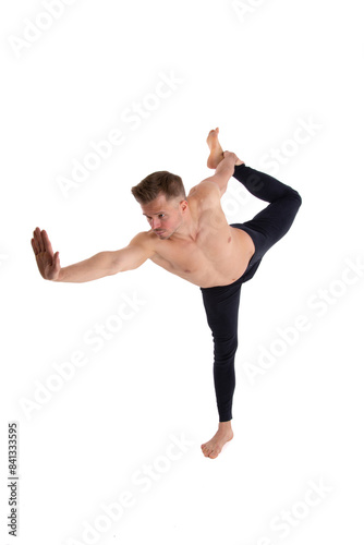 Fitness and Yoga. Healthy lifestyle. Young attractive man posing in the studio. White background.