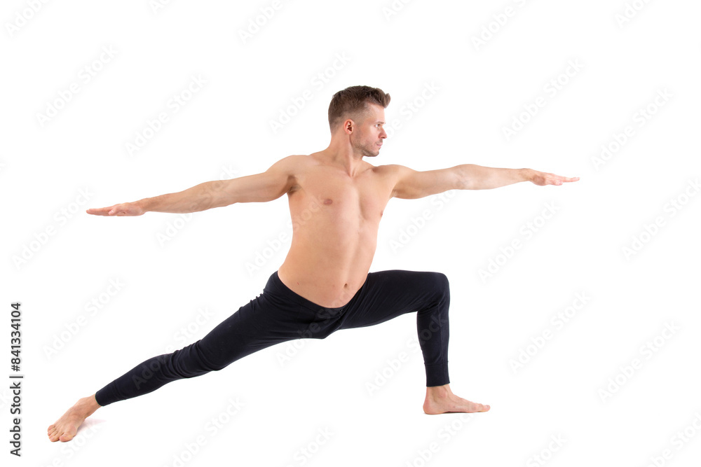 Fitness and Yoga. Healthy lifestyle. Young attractive man posing in the studio. White background. Fitness and Yoga. Healthy lifestyle. Young attractive man posing in the studio. White background.