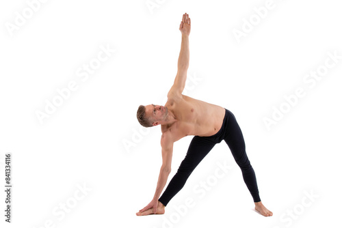 Fitness and Yoga. Healthy lifestyle. Young attractive man posing in the studio. White background.