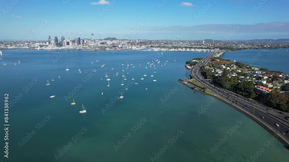 State Highway And Traffic Along The Oneoneroa Shoal Bay In Auckland, New Zealand - Aerial Drone Shot State Highway And Traffic Along The Oneoneroa Shoal Bay In Auckland, New Zealand - Aerial Drone Shot