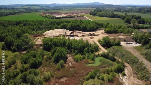 A Comprehensive Sight of the Old Sand Quarry Near the Town of Prudnik, Poland - Aerial Drone Shot photo