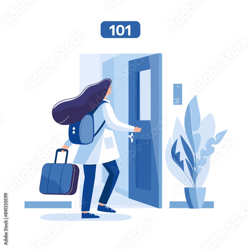 A woman with long hair wearing white scrubs is opening the door to her apartment, carrying luggage in one hand