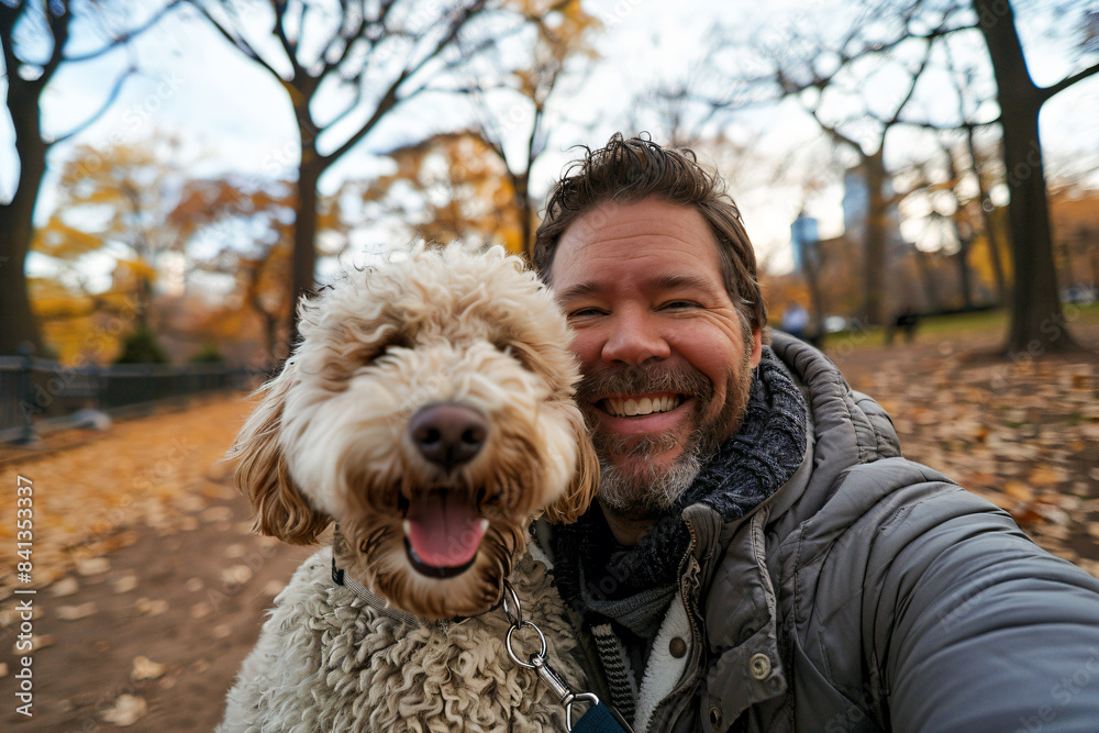 a man taking a selfie with his dog a man taking a selfie with his dog