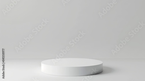Minimalist white round pedestal against a plain background  perfect for showcasing products or design concepts with a clean aesthetic.