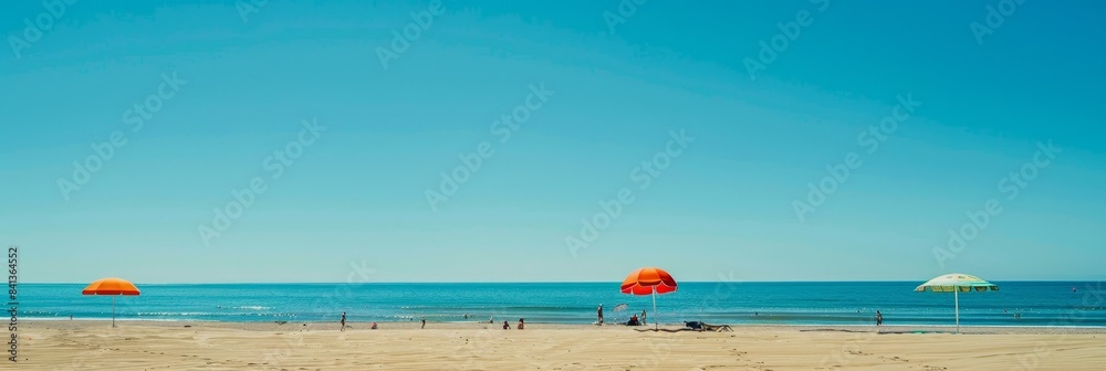 Sunlit Beach with Umbrella and Chairs, Perfect for Summertime Leisure and Vacation Ads Sunlit Beach with Umbrella and Chairs, Perfect for Summertime Leisure and Vacation Ads