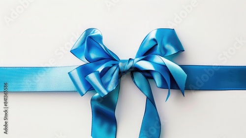 Satin cloth tied as a bow to make a birthday gift ribbon used for presents or wedding decoration. The design is isolated on a white background,Blue Bow Ribbon,Blue gift bow with diagonal ribbon   © Liaqat