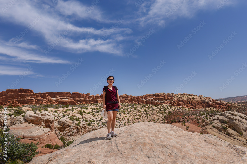 Female tourist at Arches National Park. Utah. USA.