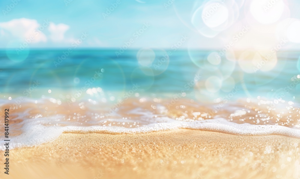 Background image of a tropical beach at sunset with a blurred horizon. Light sand of a beach against sparkling ocean water. Natural seascape. Background image of a tropical beach at sunset with a blurred horizon. Light sand of a beach against sparkling ocean water. Natural seascape.
