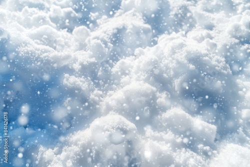 This is a beautiful background image of snowy nature with a blueish tint - texture of pure fluffy fresh snow.