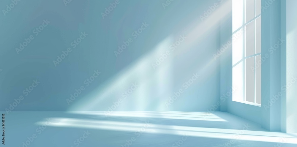 Light and intricate shadows from a window on the wall give this minimal abstract blue background a subtle feel.