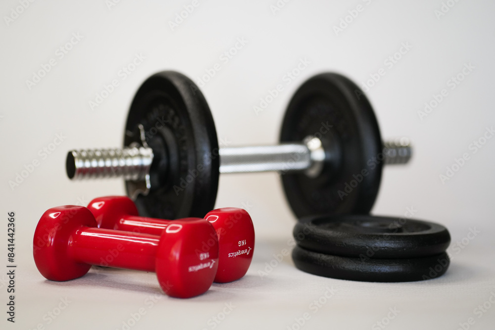 Naklejka premium Dumbbells for sports are on a white background