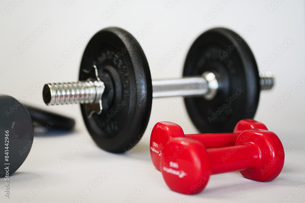 Naklejka premium Dumbbells for sports are on a white background