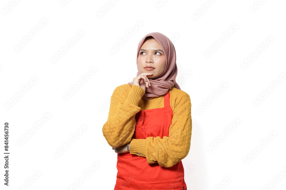 Portrait of smiling woman in hijab and apron isolated on white background.