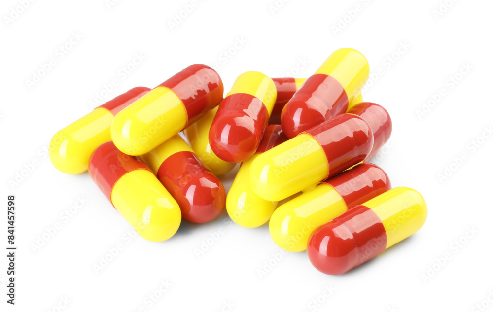 Many antibiotic pills isolated on white. Medicinal treatment Many antibiotic pills isolated on white. Medicinal treatment
