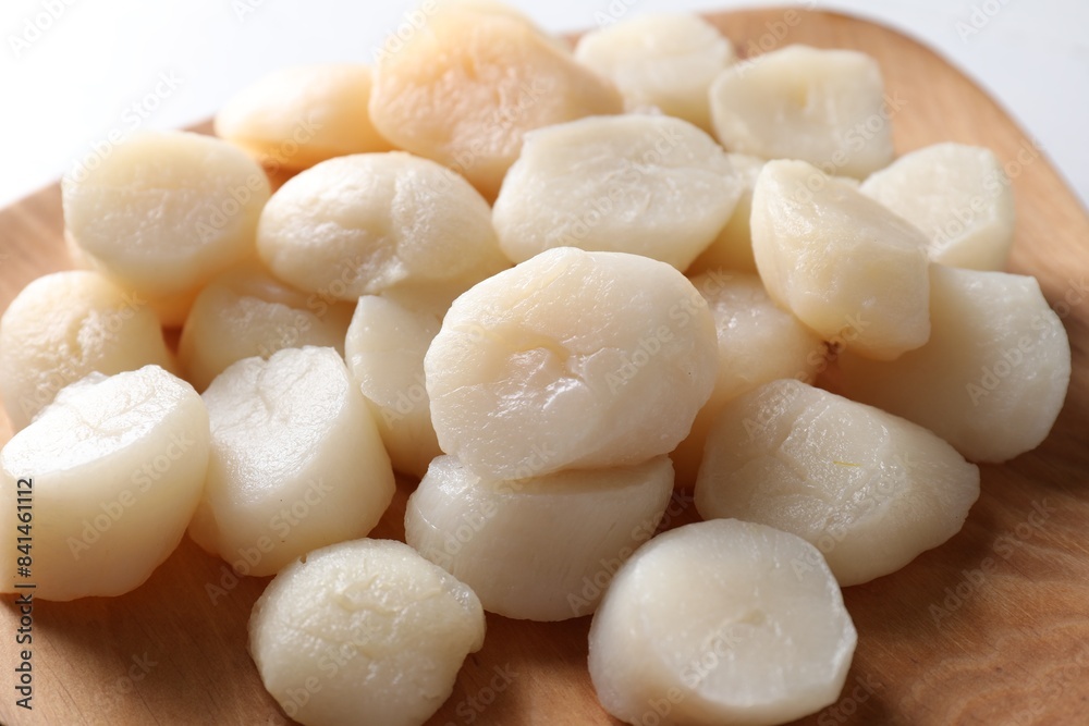 Fresh raw scallops on white table, closeup Fresh raw scallops on white table, closeup