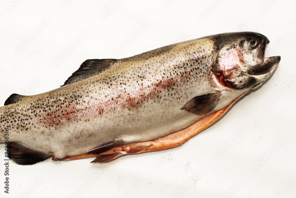 Fish red river trout, cleaning the scales, home cooking Fish red river trout, cleaning the scales, home cooking