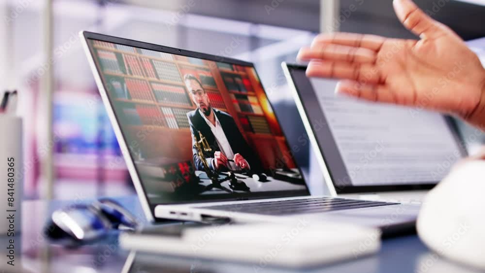African lawyer hosting online video conference call with American attorney, discussing legal matters and business strategies African lawyer hosting online video conference call with American attorney, discussing legal matters and business strategies